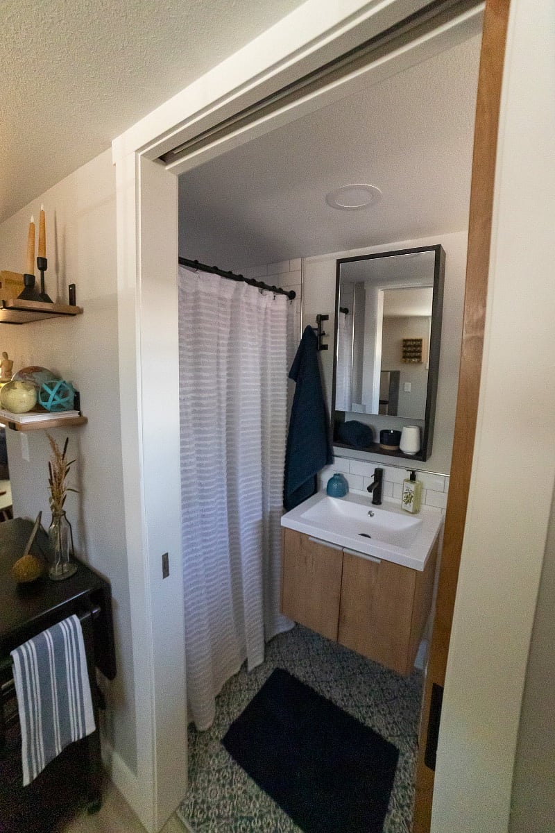 Bathroom with shower, vanity, medicine cabinet
