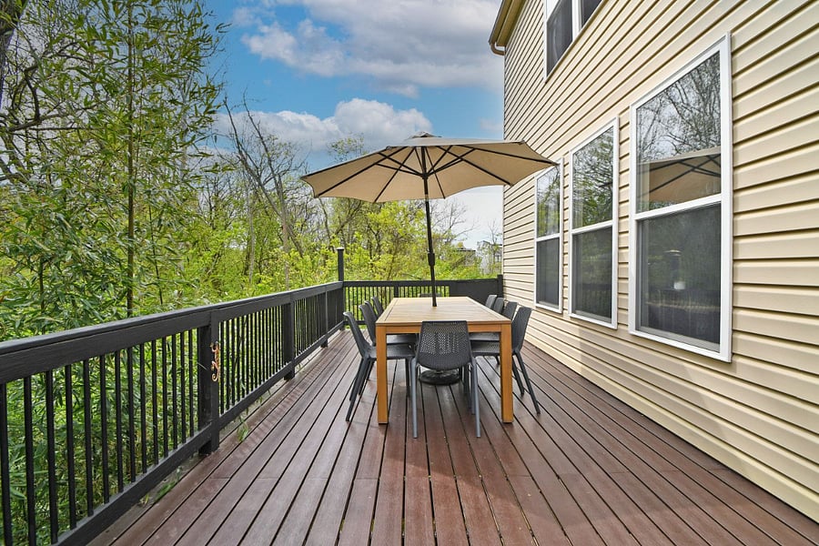 Large outdoor deck overlooking the woods.