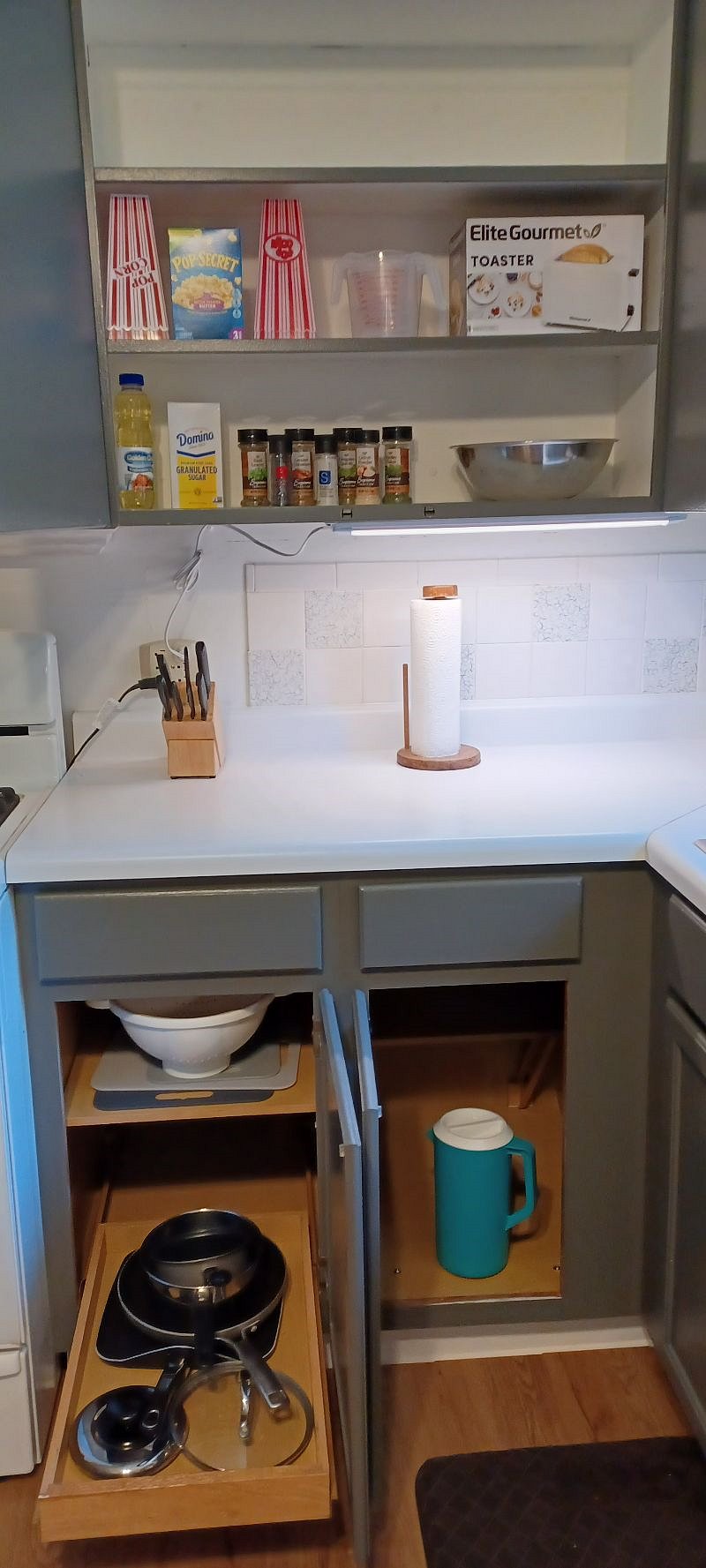 full kitchen--pots, pans, knives, spices, and popcorn (our favorite!)