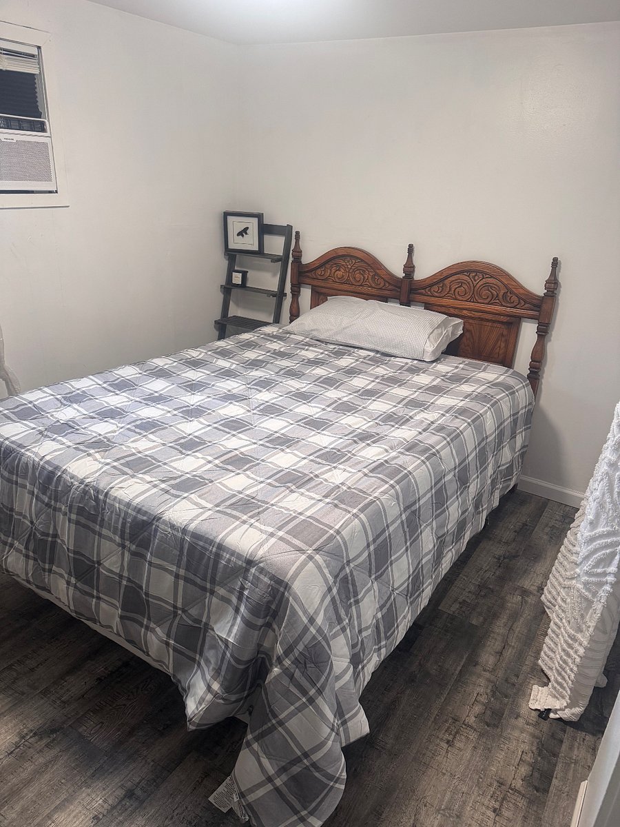 Queen bed in spare bedroom