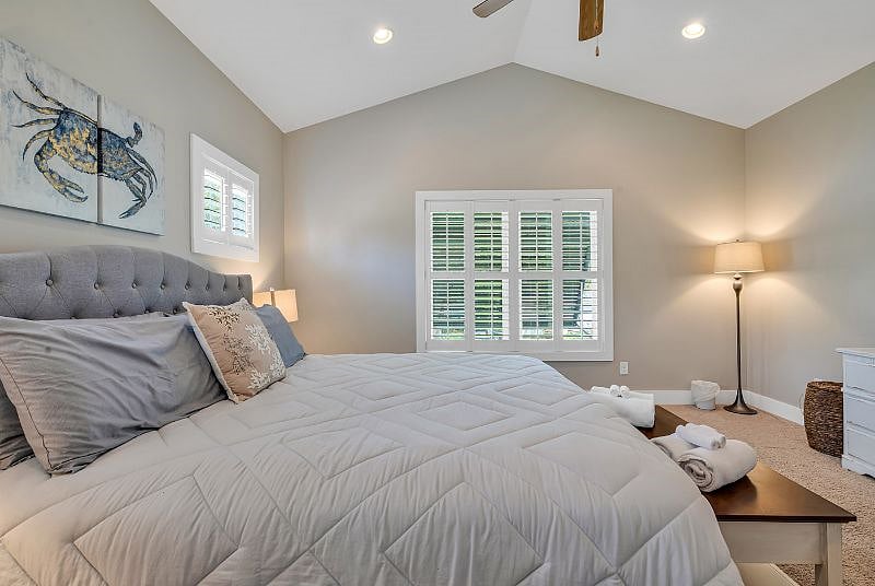 Comfortable King size bed and luxurious Plantation shutters. Ceiling fan to keep you comfortable while you sleep. 