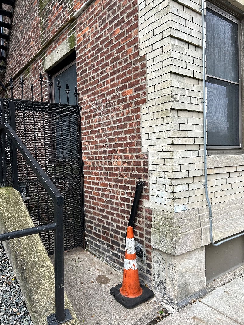 Gate to get to trash and pet walking area.