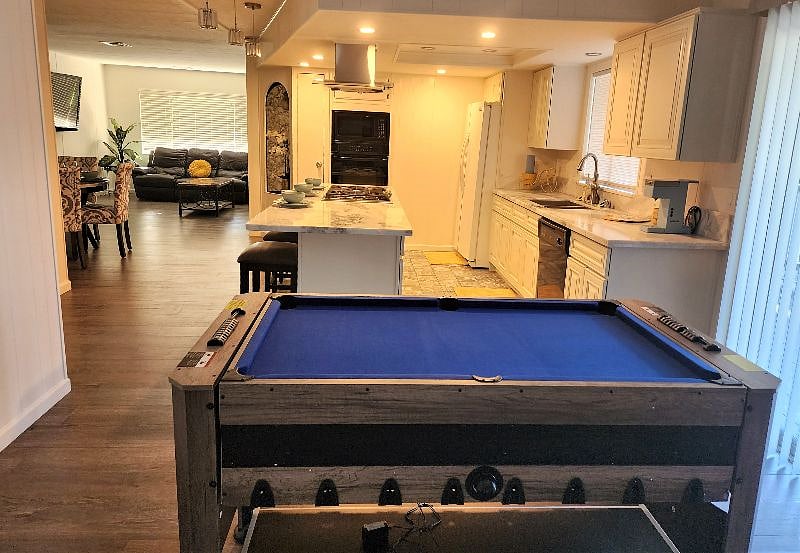 4-in-1 gaming table for pool, ping pong, air hockey and frooze ball
