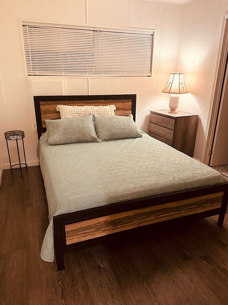 Cozy queen-sized bed, 48" TV and private bath access