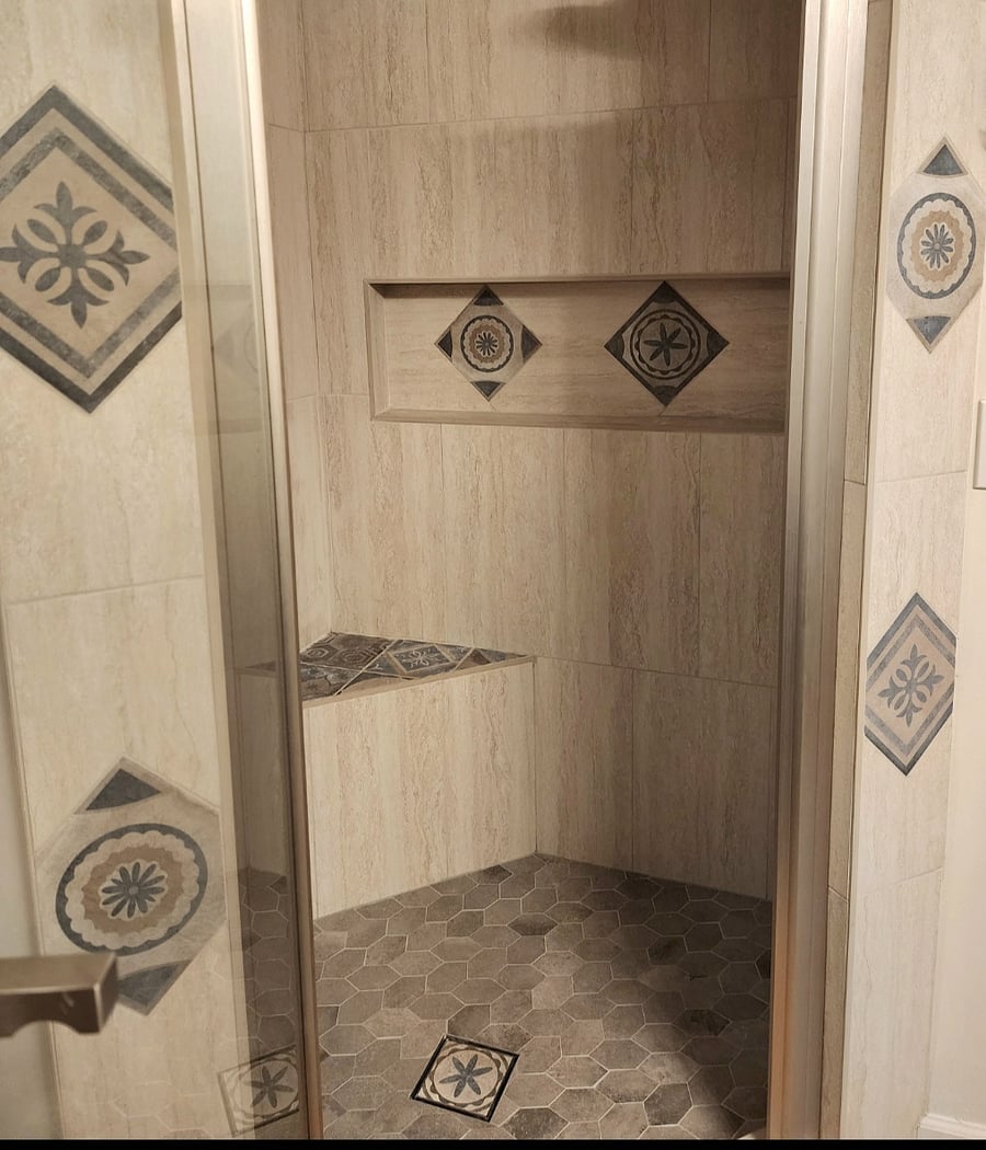 Spacious walk-in shower for two with dual heads.