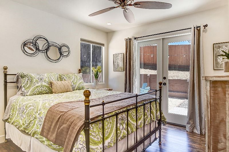Second bedroom with Queen Bed and French Doors going out to the back patio