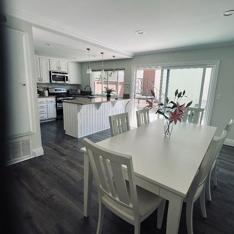 Kitchen/dining room with a sliding door to the patio and two car garage