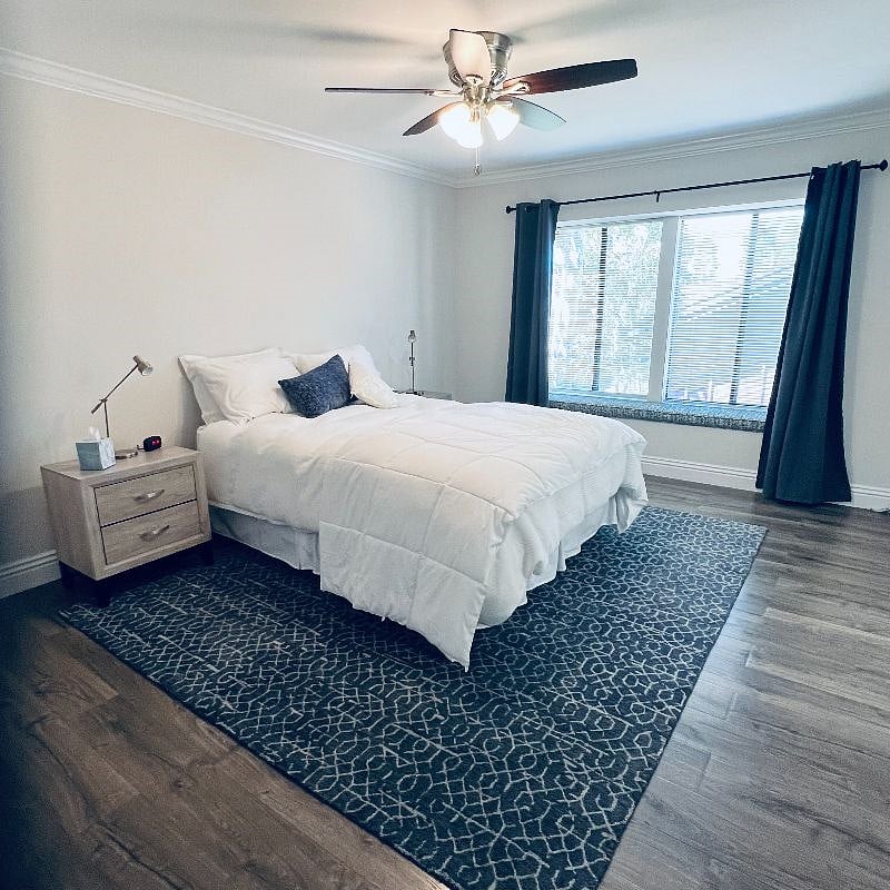 Main bedroom with window seat, walk in closet and en-suite bath