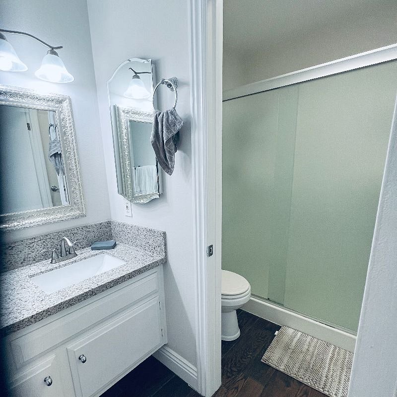 En-suite bath with shower