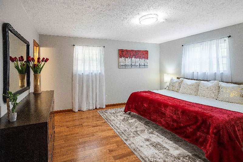Primary bedroom with King bed and ensuite full bathroom