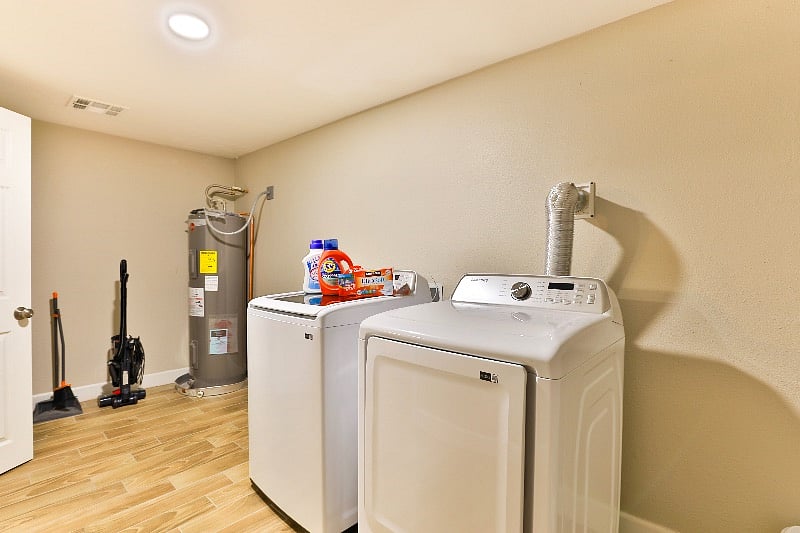 Washer dryer room with cleaning tools