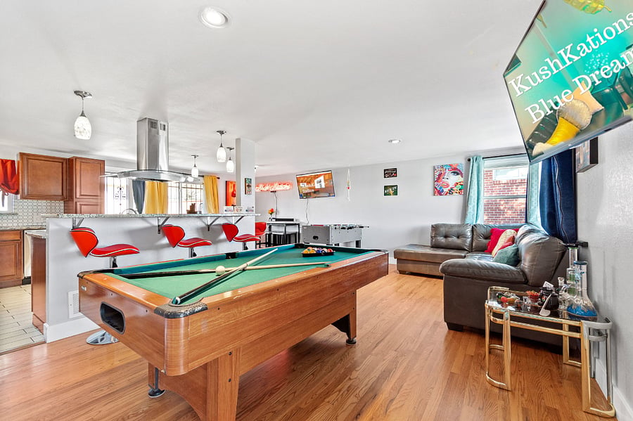 Game Night Extravaganza: Living Room Magic with Pool Table and Arcade Adventures! - Create a game night extravaganza in your living room, where magic unfolds with the presence of a pool