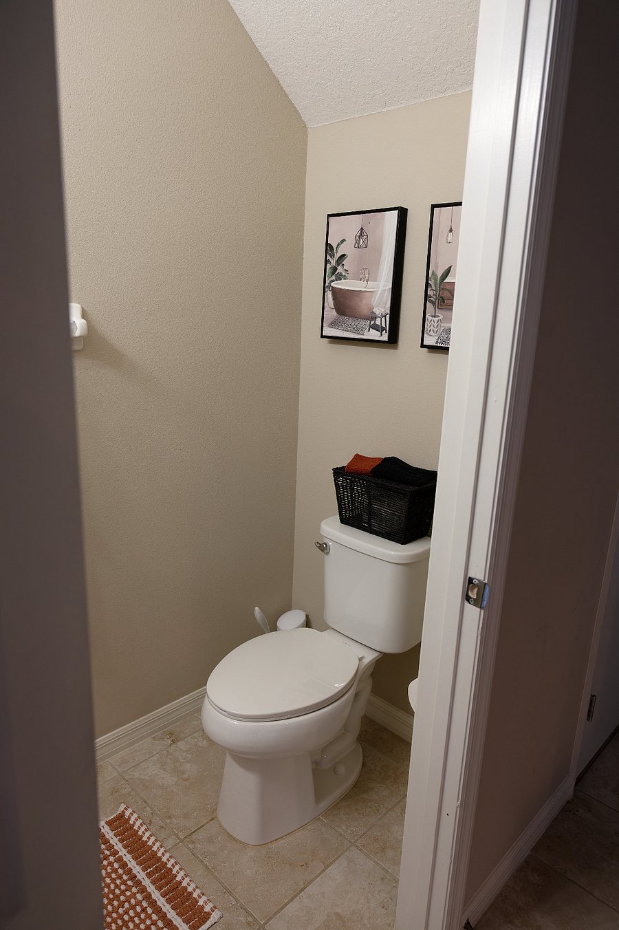 Half Bath near entryway, perfect for guests.