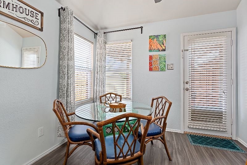 Two additional wooden chairs added here if residents need more than four dining chairs.