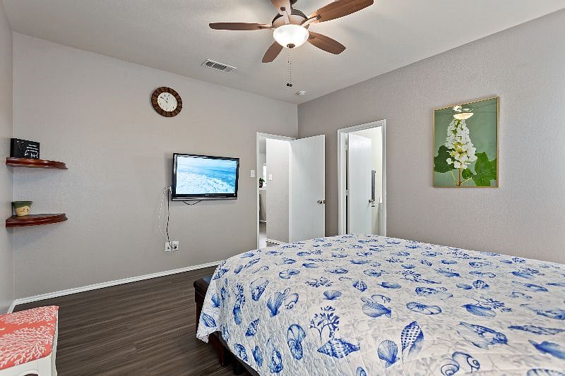 Master Suite; Writing desk (#2) & chair added in the master bedroom; Updated a pair of night lights. Upgraded new LED lighted ceiling fan. Blackout curtains.