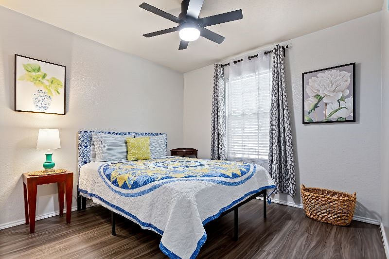 32 inch Samsung TV with Google Chromecast recently added to this secondary bedroom (#2); added a small bench in this room.