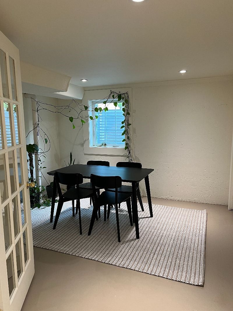 dining room (or office space) with laundry in closet)