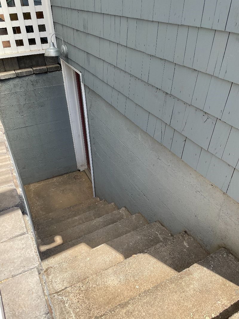 private staircase to unit from driveway