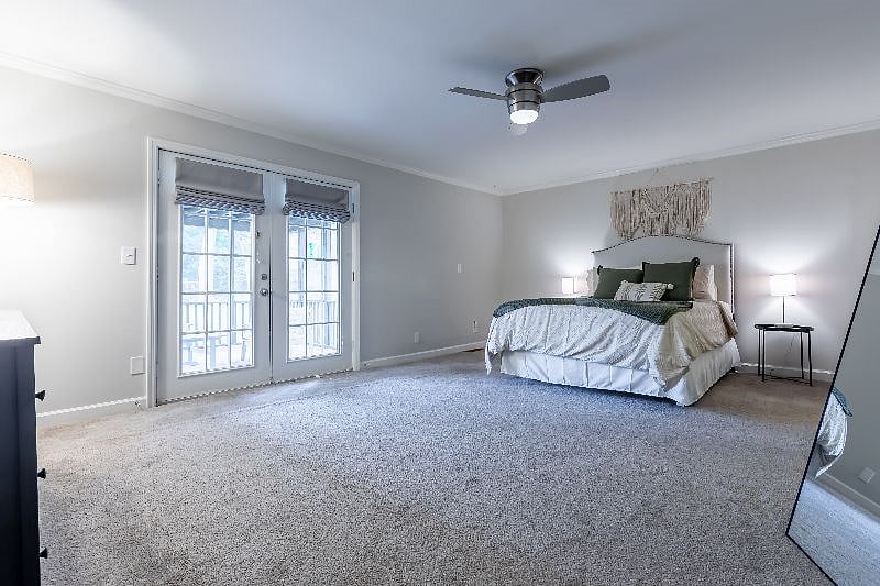 Master Bedroom, opens to screened in porch.