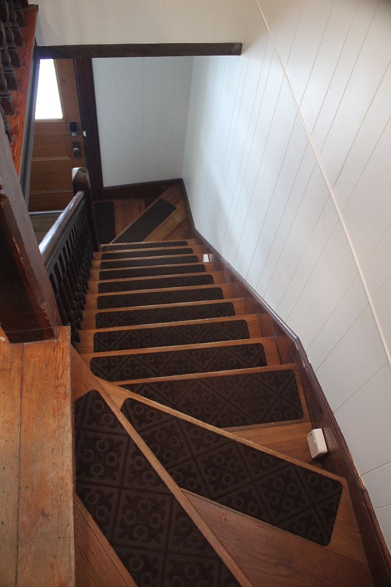 Stairs lit by motion-activated night lights