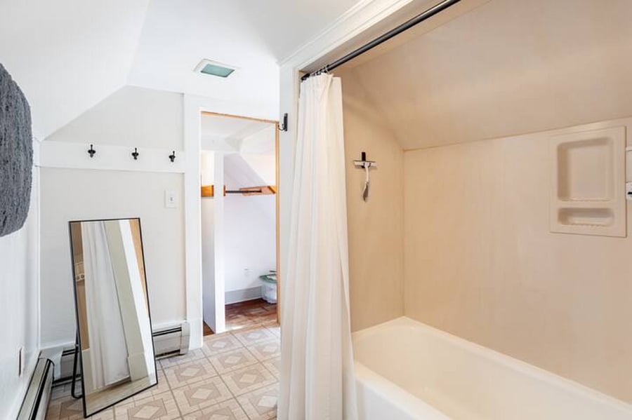 Full-length mirror in bathroom
