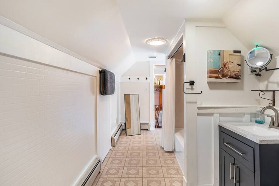 Large open bathroom with shower & tub on 2nd floor.