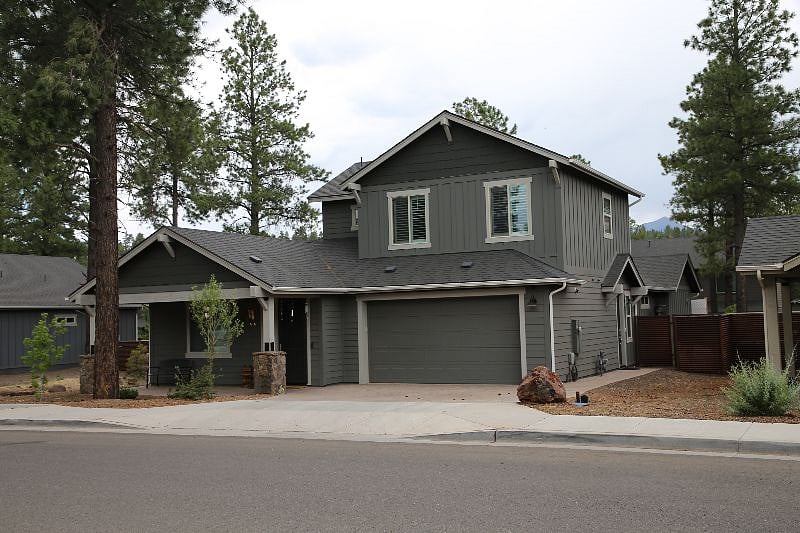 Front of house. Parking on the right side of the driveway.