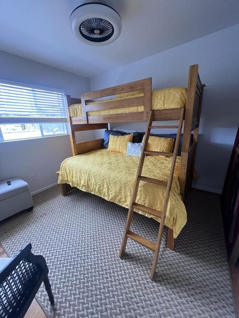 Bunk beds with a full on the bottom and a twin on the top.
