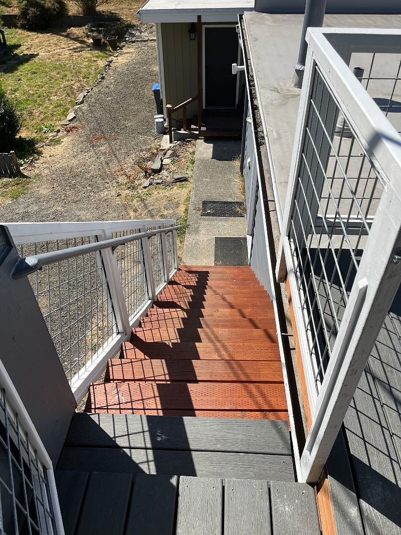 Private exterior stairs to parking lot