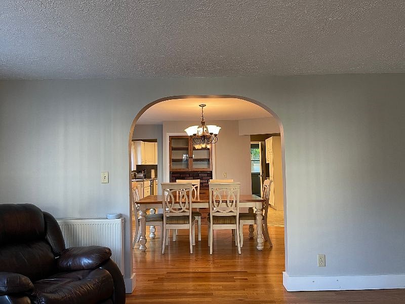 View from Living Room to the other end of the apartment and back entrance