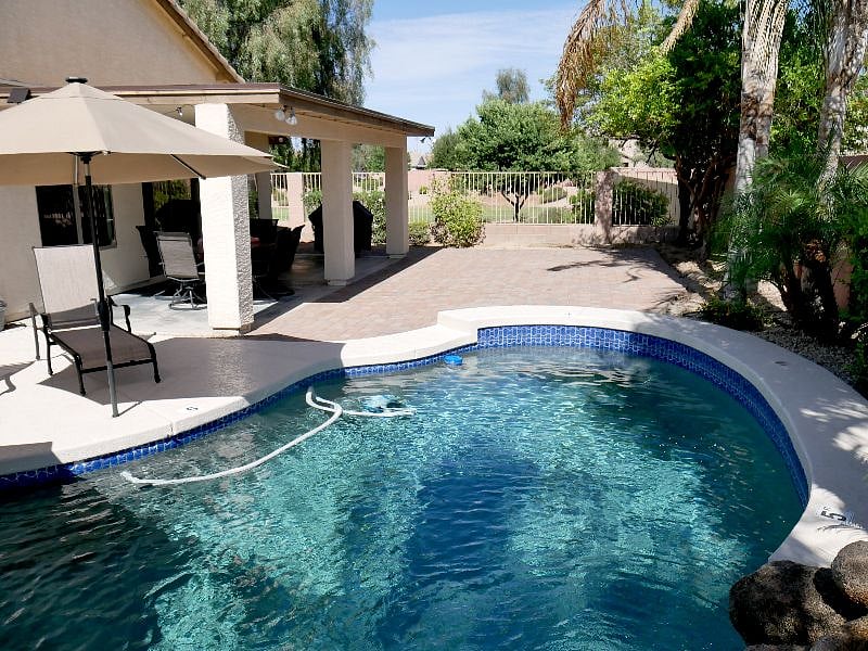 There's plenty of room to make yourself comfortable and entertain in this totally renovated backyard living space. Not pictured: a brand new fire pit and comfortable Adirondack chairs.