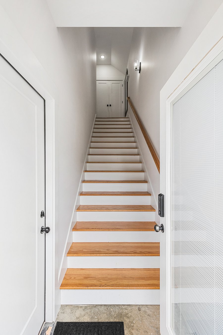 Private entry with stairs up to apartment