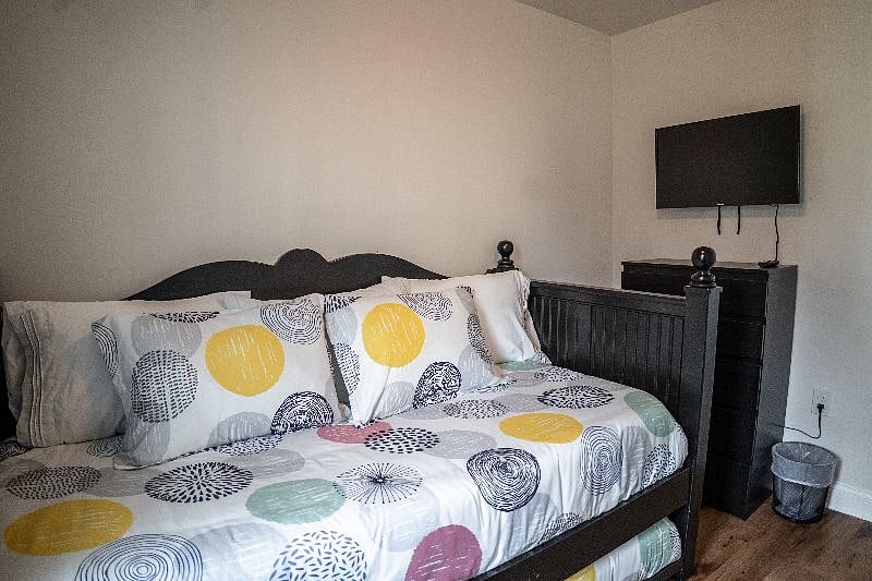 Twin size day bed with pull out twin. Smart TV