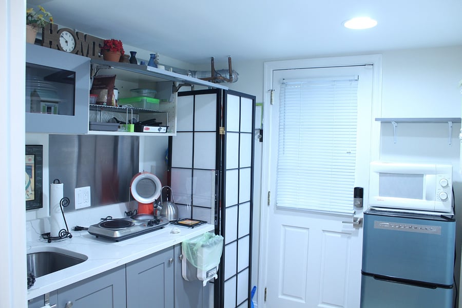 Another view of the kitchenette with refrigerator/freezer and microwave oven.