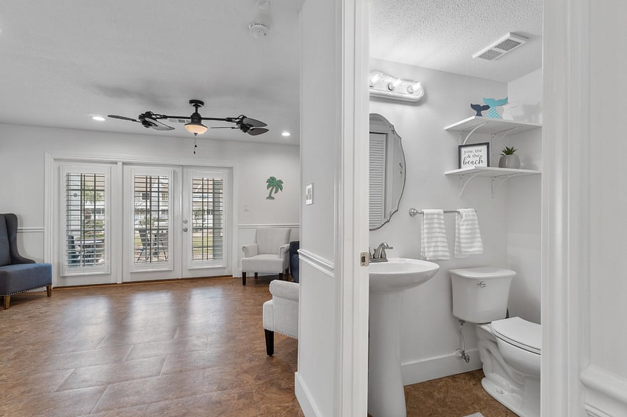 Easily accessible half bath next to the living area