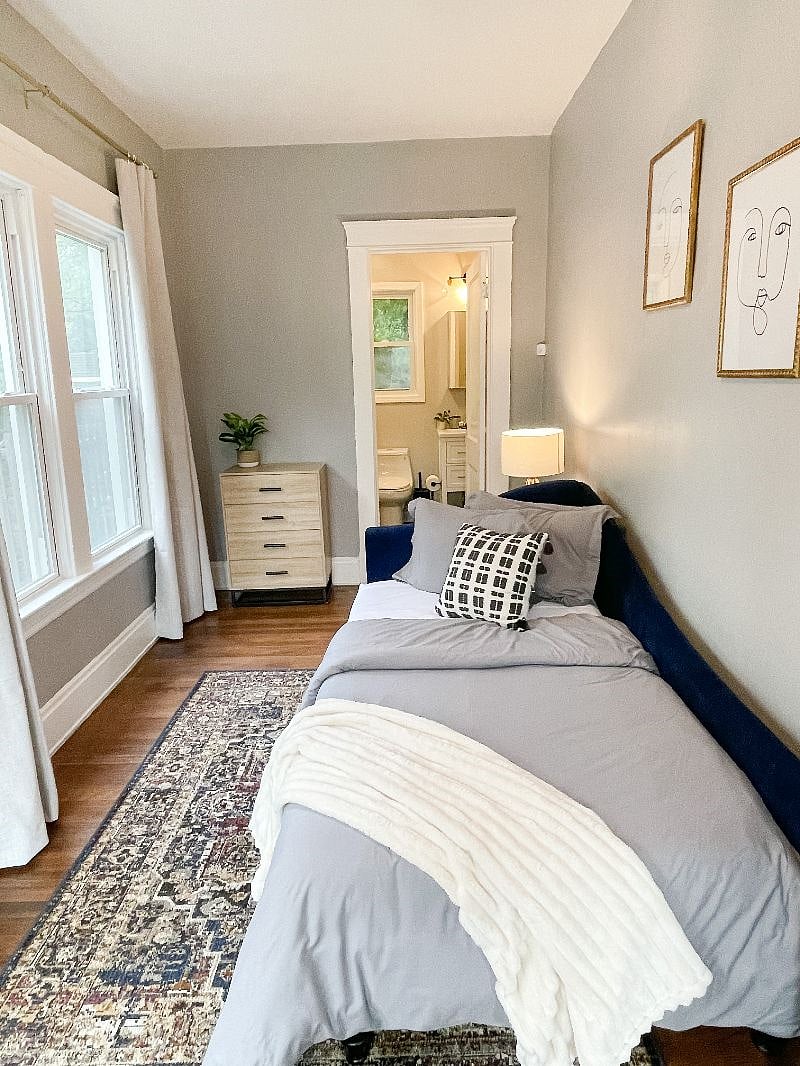 Relax in the comfort of the first-floor bedroom, complete with an adjacent full bathroom for your convenience.