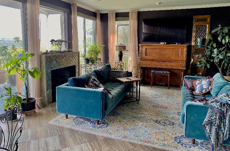 Downstairs living room with large screen television