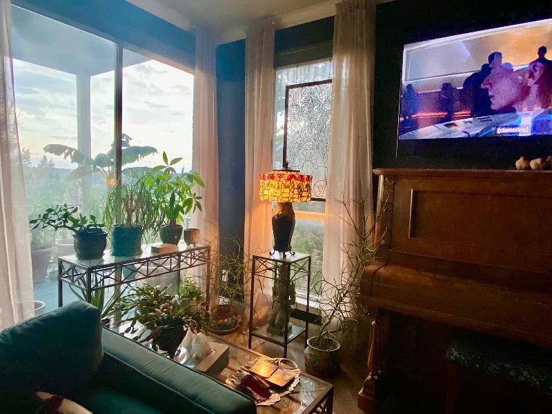 Cozy and comfortable main living room has large television.