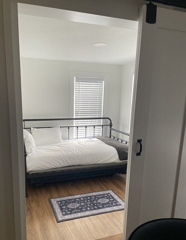 Small bedroom with twin bed + trundle.
