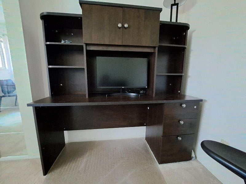 Two work stations available on upper level with desks and office chairs