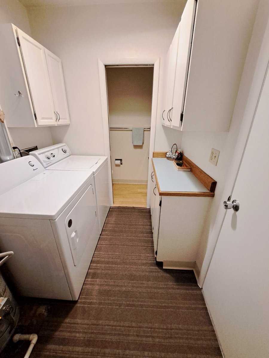Laundry/furnace room with storage area and entrance to/from garage on Ground Level