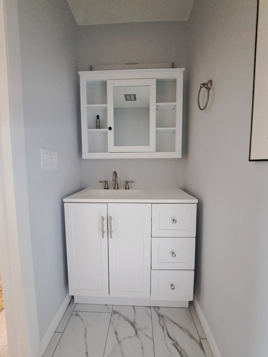 Upstairs half bath attached to Bedroom 1 (Updated Sep. 2025)