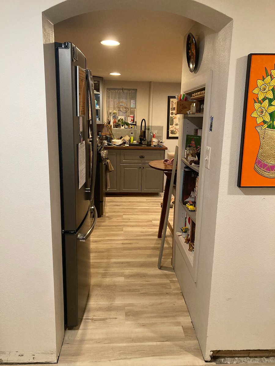 Archway from kitchen into living room
