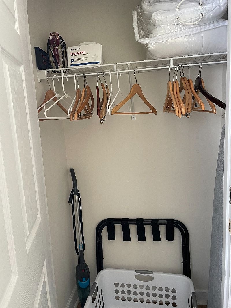 Master bedroom closet with many hangers! 