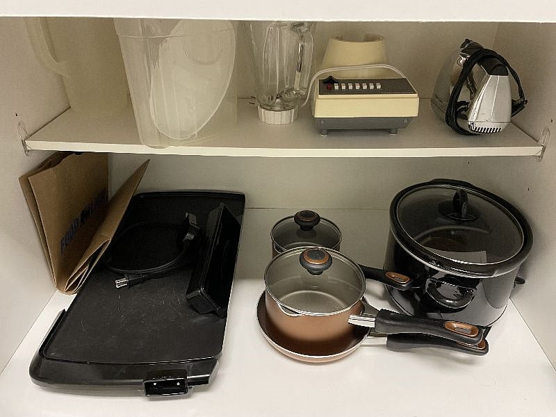 Small appliances and drink pitchersblender, griddle, mixer, crockpot. 