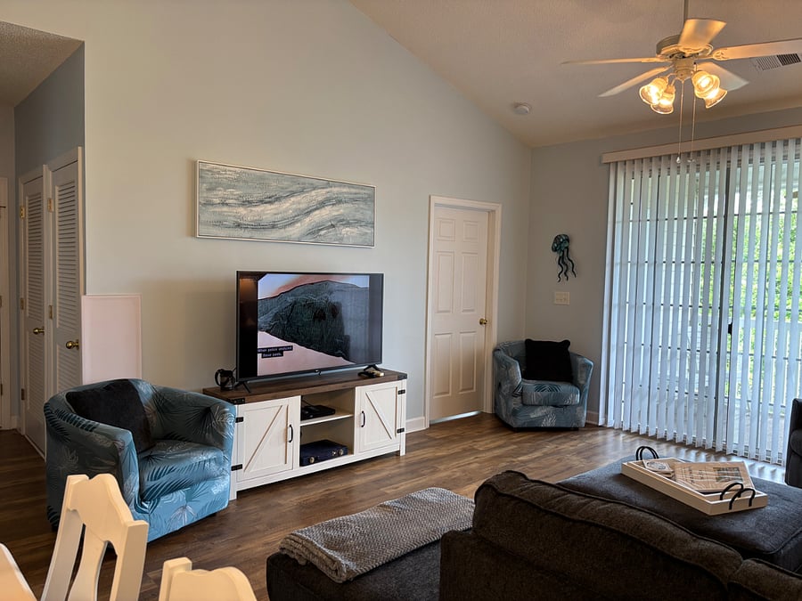 Newer smart TV for you to connect to your streaming services.  

-Cable also included.  
-Books, puzzle books, adult coloring book in cabinet  
-DVD player & DVDs.  
-Backgammon game 