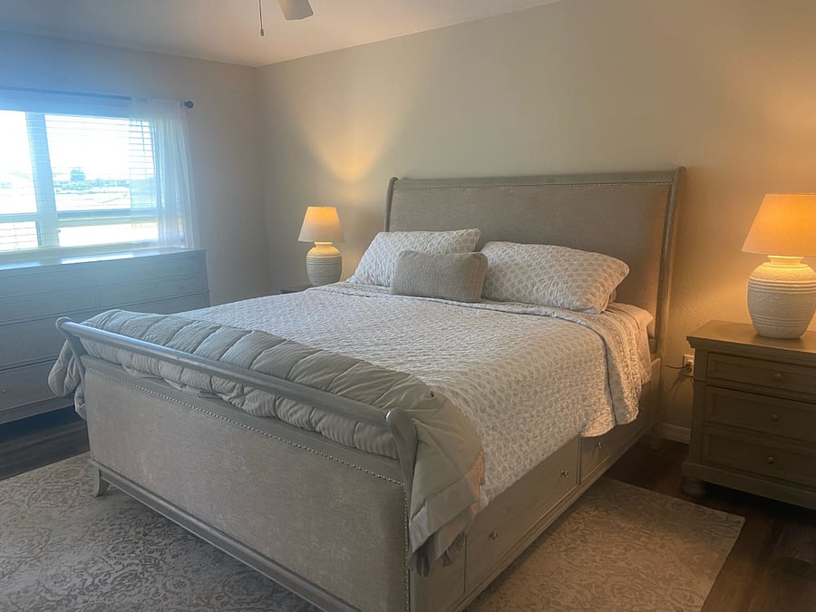 King size bed in master bedroom with a brand new mattress. Extra sheets included.