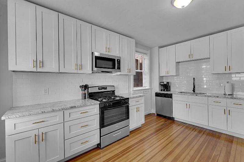 Full-size kitchen with brand new appliances and cabinets. Fully stocked with all needed to cook a huge gourmet meal