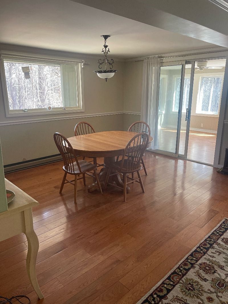 Dining Area with 3 seasons porch in the back