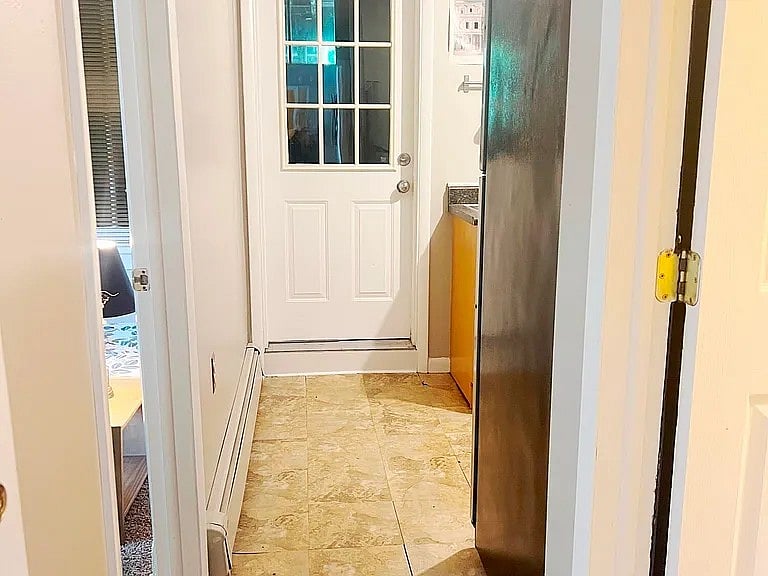 Apt FLR 1 - Rear Path (Bedroom 3 on the left and Kitchen on the Right)